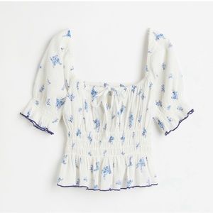H&M Blue and White Floral peplum top with navy detail on sleeve OBO